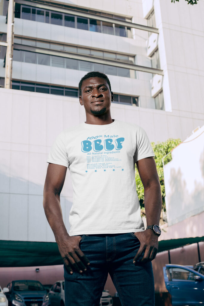 black man standing tall in his 100% male BEEF t-shirt